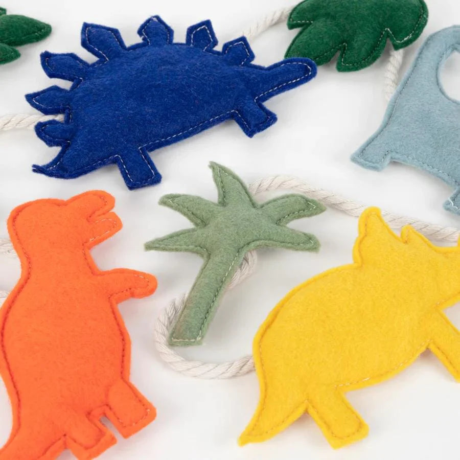 Vilten dinosaurus slinger